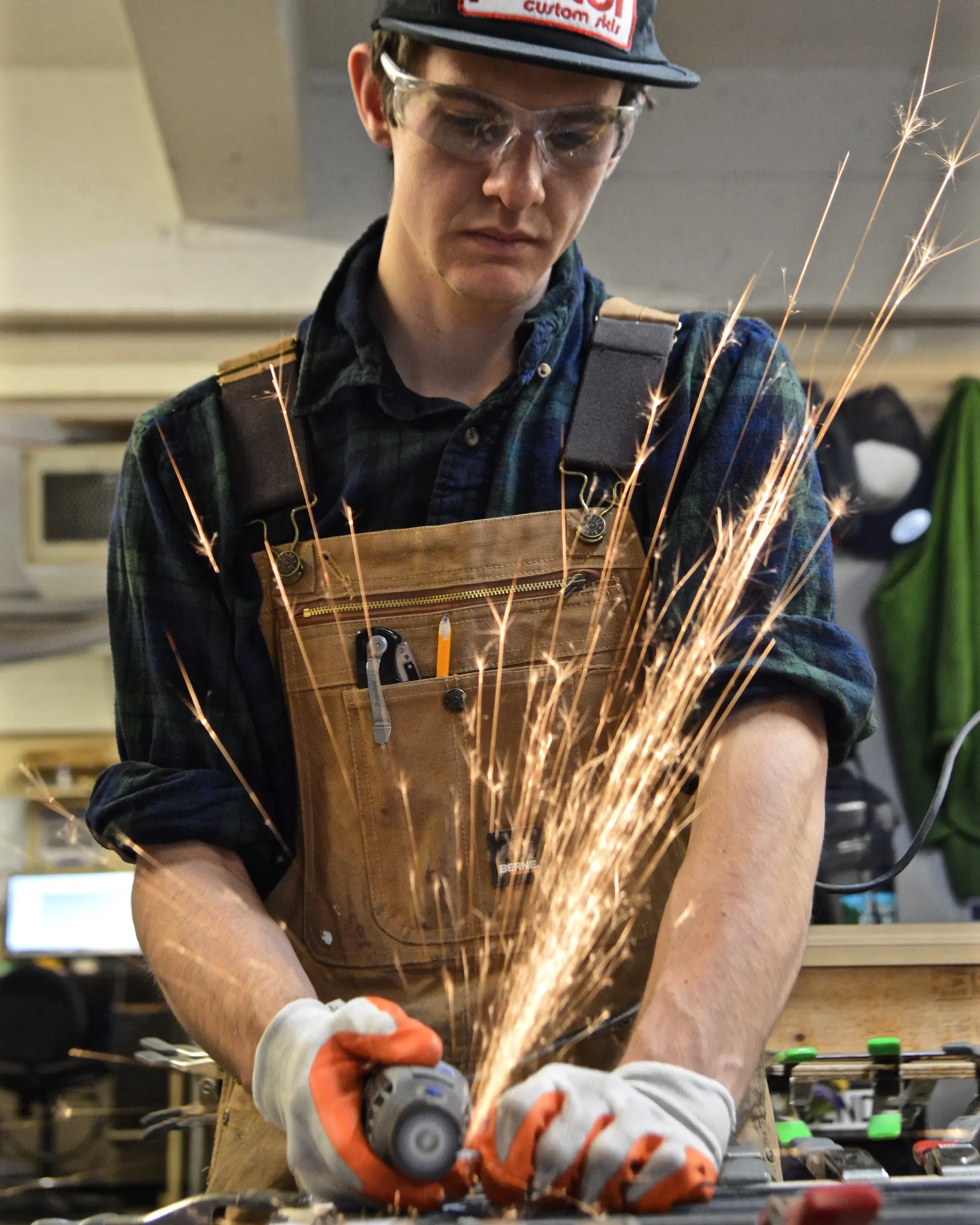 Grinding a ski edge in the Parlor Custom Skis shop